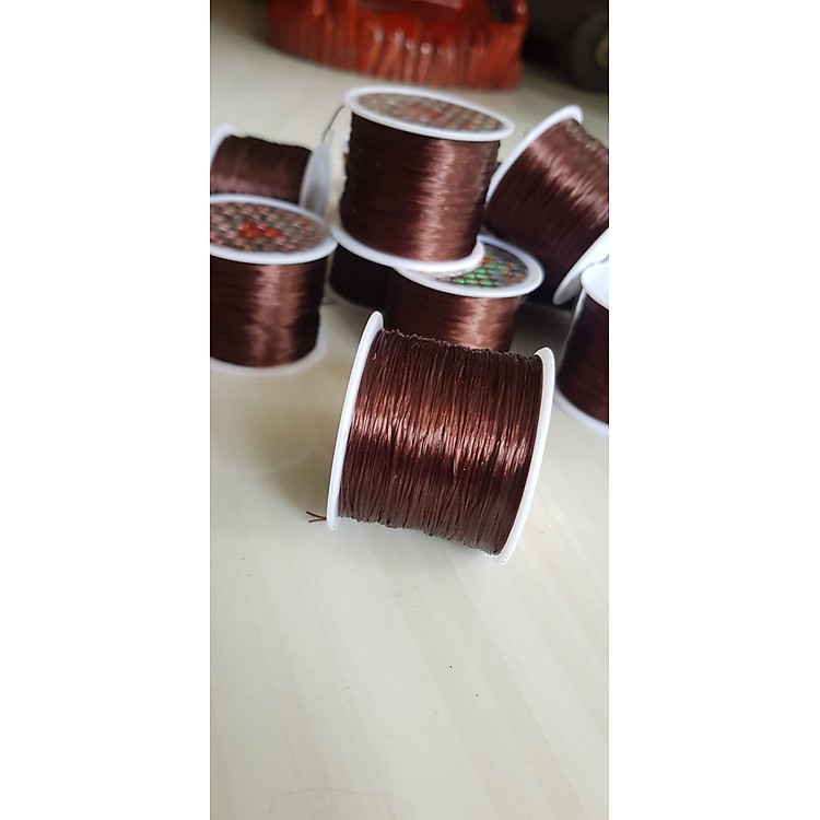 Cuộn Dây Thun CO GIÃN màu Nâu chuyên xỏ vòng đeo tay hạt chuỗi Dây này là dây thun chuyên xỏ vòng chuỗi màu Nâu, có đủ màu Anh Chị đang đeo chuỗi muốn thay dây khác cho vòng thì...