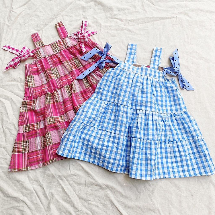 Đầm 2 dây caro nơ trễ vai