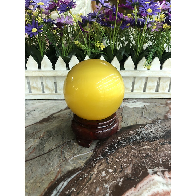 Quả cầu phong thủy đá mắt mèo vàng