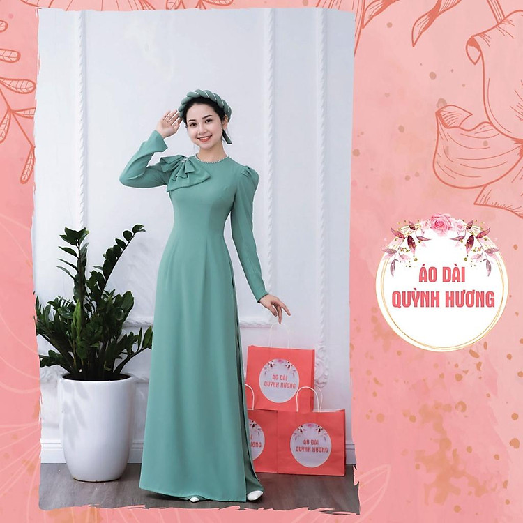Áo dài lụa mỹ màu xanh mint cổ tròn đính nơ chéo vai