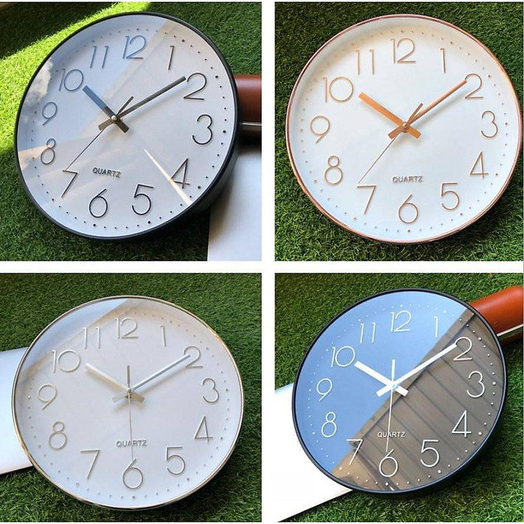 Đồng hồ treo tường kim trôi mạ vàng QUARTZ.