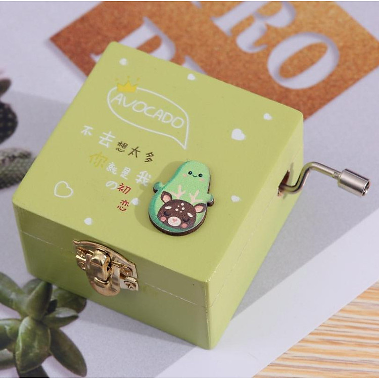 Hộp nhạc gỗ Nhóc quả Bơ