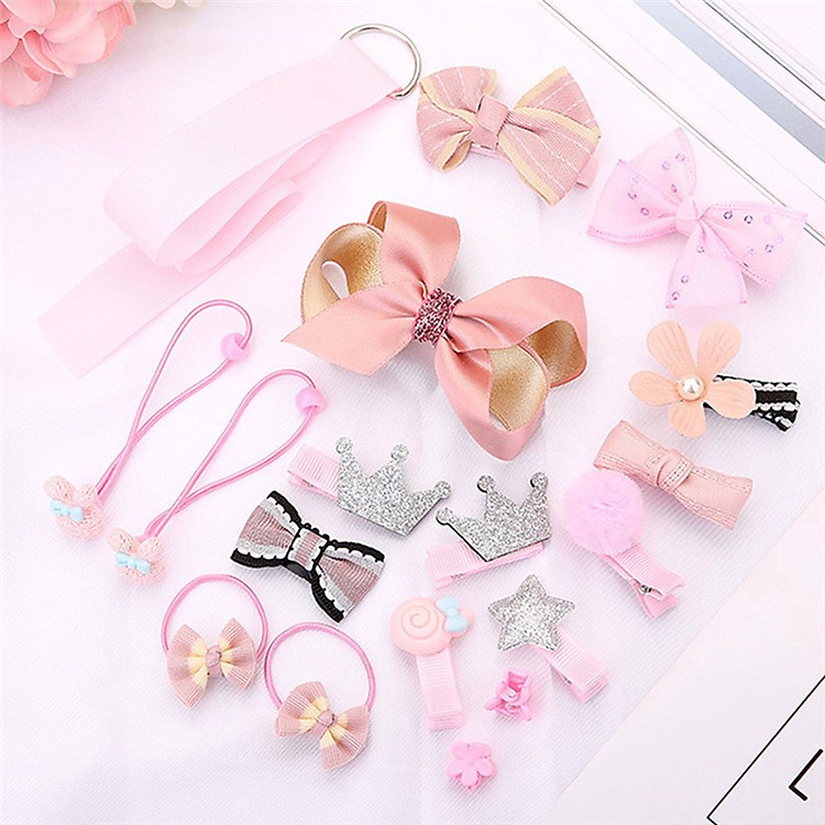 Bộ phụ kiện nơ tóc cho bé gái màu hồng