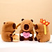 Thú nhồi bông capybara gõ mõ ngộ nghĩnh - Size 35cm - Quà tặng gấu bông chuột lang nước dành cho người cần tịnh tâm.