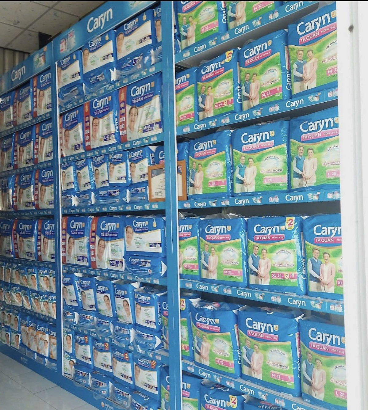 Mẫu mới nhất - Tã dán Caryn XL20 Siêu thấm Đệm thấm xanh bảo vệ vùng xương cụt - Tã dán người già, người lớn tuổi Caryn