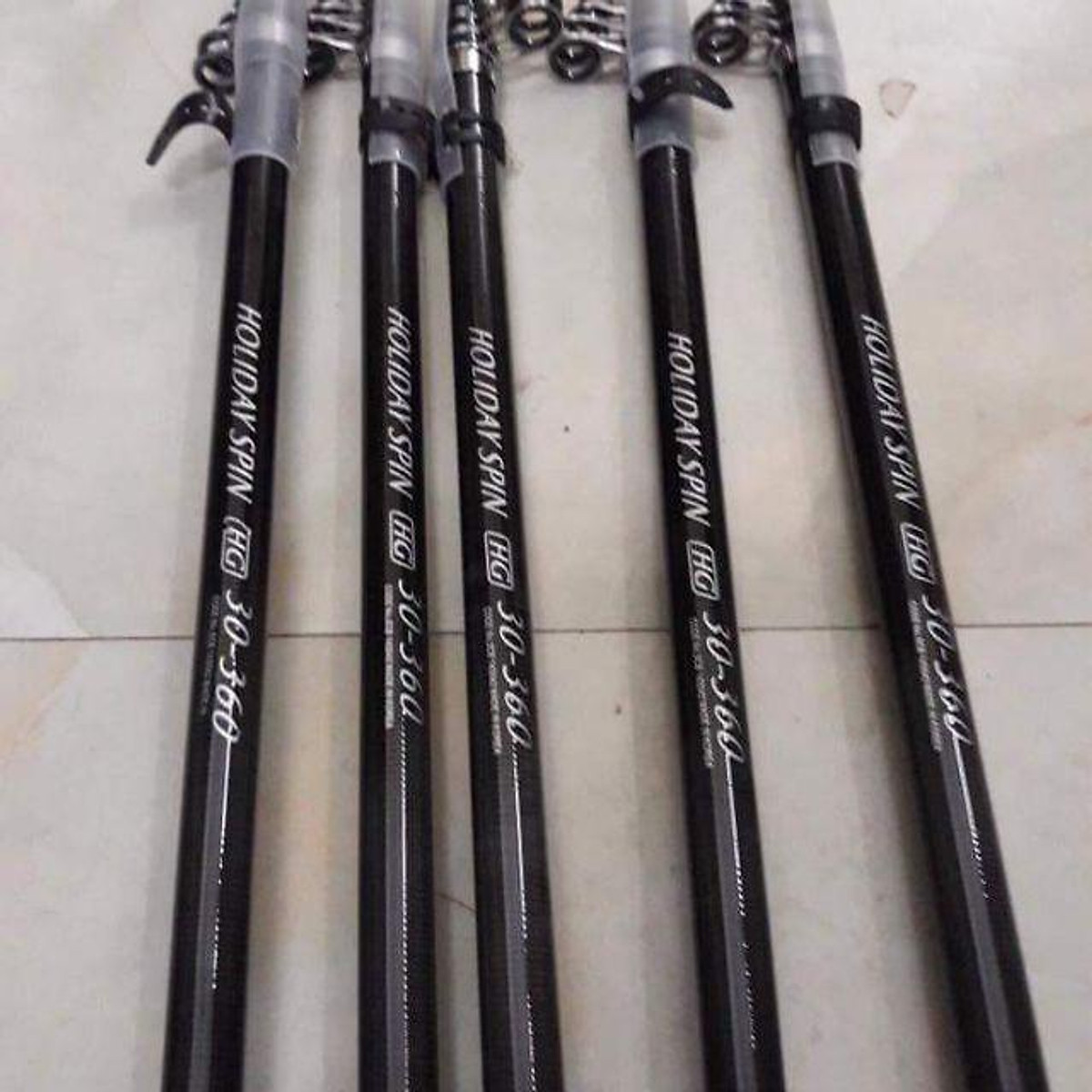 Mua Cần câu lục holiday spin Tiki