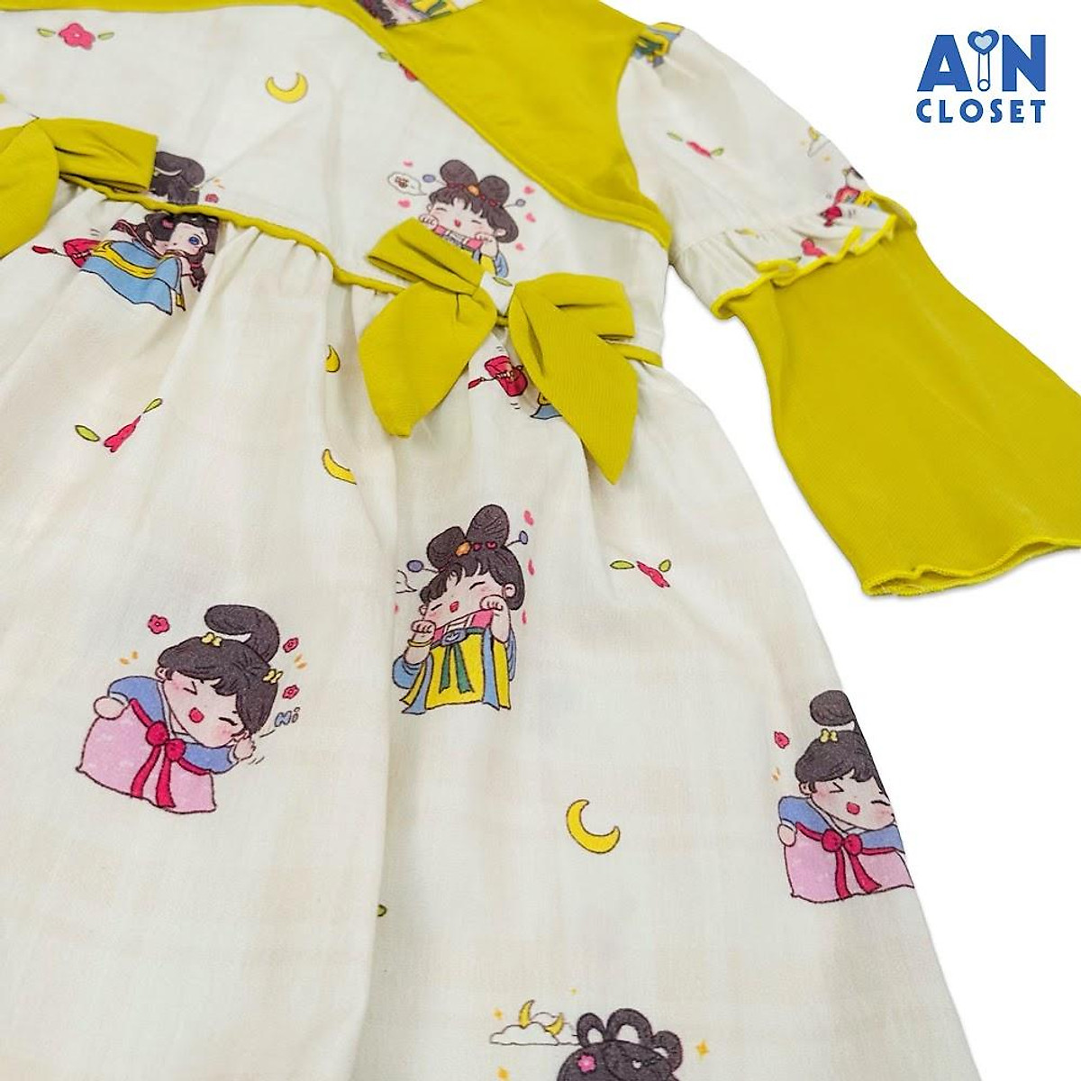 Đầm tay lỡ bé gái họa tiết Tiên Nữ Nơ Vàng cotton - AICDBG8HGXW3 - AIN Closet