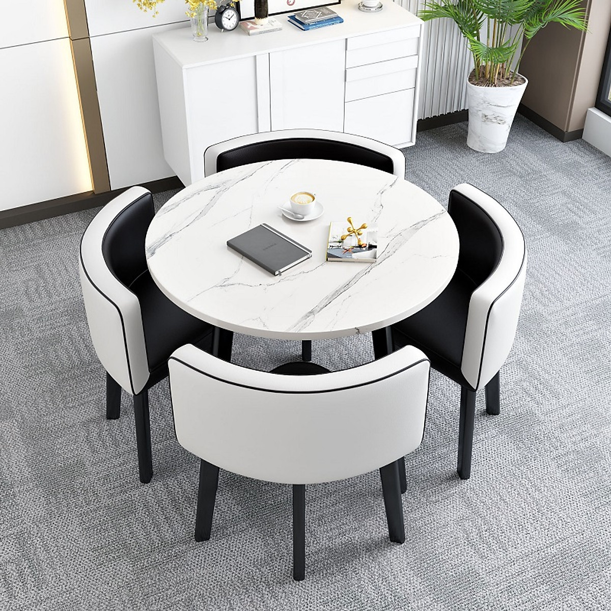 Bộ bàn ăn mặt vân đá sẽ làm cho căn phòng ăn của bạn trông sang trọng và đẳng cấp hơn. Với mặt đá tự nhiên và thiết kế tinh tế, bộ bàn ăn này sẽ trở thành một tác phẩm nghệ thuật trong căn phòng của bạn.