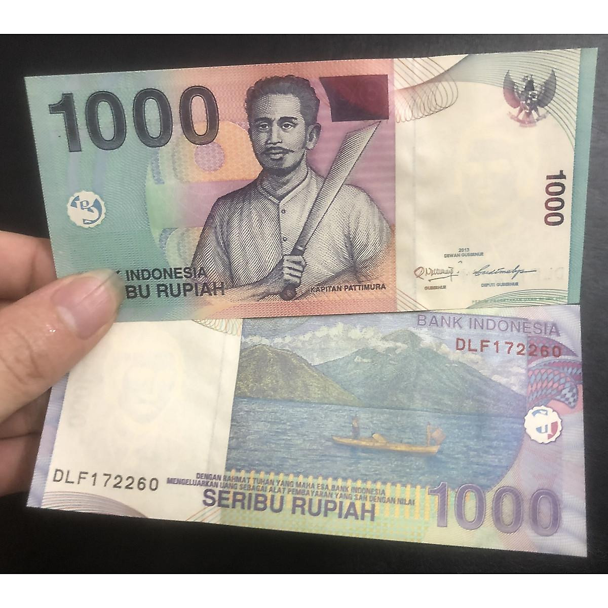 Tiền cổ 1000 Rupiah Indonesia, hình ảnh người đàn ông cầm kiếm