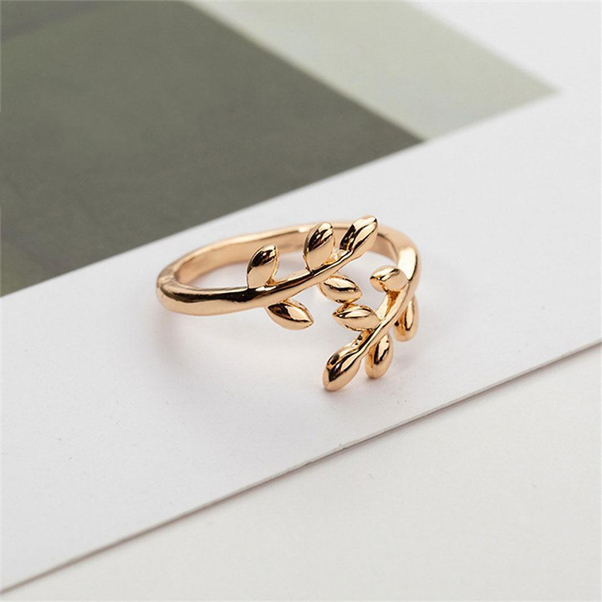 Open ring adjustable ring woman in steel gilded with fine gold laurel leaf