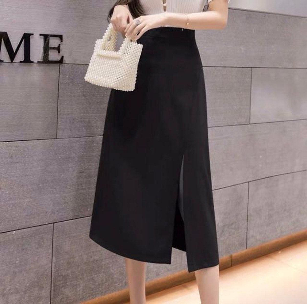 Chân váy chữ A xẻ trước vạt lệch