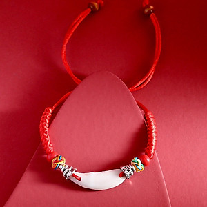 VÒNG TAY , LẮC TAY DÂY ĐỎ NANH CHÓ MỰC TRỪ TÀ HỘ MỆNH