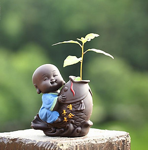 Tượng chú tiểu cưỡi cá chép - trồng cây, cắm hoa để bàn