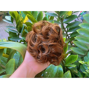 Tóc búi xoăn ngoặm trung niên