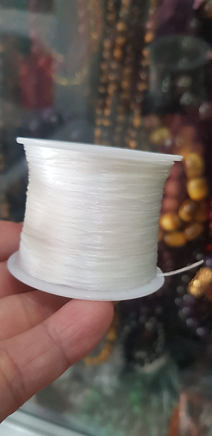 Cuộn Dây Thun CO GIÃN màu Trắng xỏ vòng hạt chuỗi Dây này là dây thun chuyên xỏ vòng chuỗi màu Trắng, có đủ màu Anh Chị đang đeo chuỗi muốn thay dây khác cho vòng thì đặt cuộn Thun chỉ này nhé