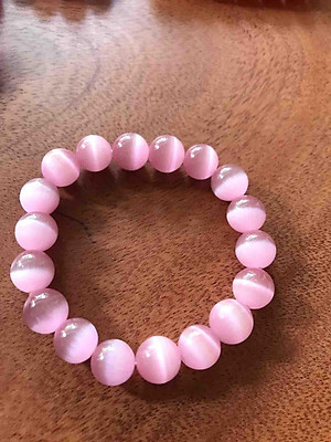 VÒNG ĐÁ MẮT MÈO 10mm HỒNG NỮ MỆNH HOẢ THỔ 