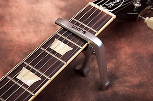 JOYO JCP-02 Guitar Capo - Kẹp Capo Guitar Đa Năng Kiêm Mở Nắp Chai & Nhổ Chốt Đàn Tặng Kèm Pick JOYO - Hàng chính hãng