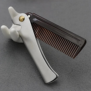 Lược gấp bỏ túi NQ12