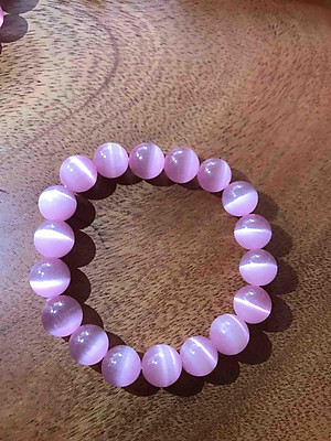 VÒNG ĐÁ MẮT MÈO 10mm HỒNG NỮ MỆNH HOẢ THỔ 