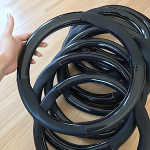 Bọc vô lăng xe Mitsubishi Xpander chất liệu da bọc vân Cacbon cao cấp