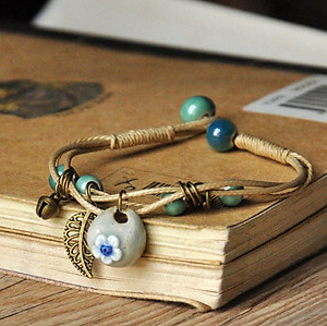 Vòng tay gốm hạt truyền thống giỏ hoa VGOM46