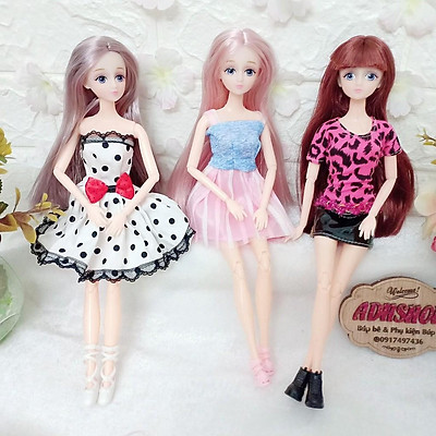 Búp bê Barbie xúng xính váy áo dự tuần lễ thời trang