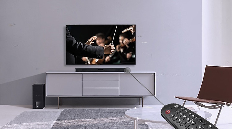 Có remote điều khiển từ xa dễ thao tác, tùy chỉnh chức năng trên loa - Dàn âm thanh LG 4.1 SL5R 520W