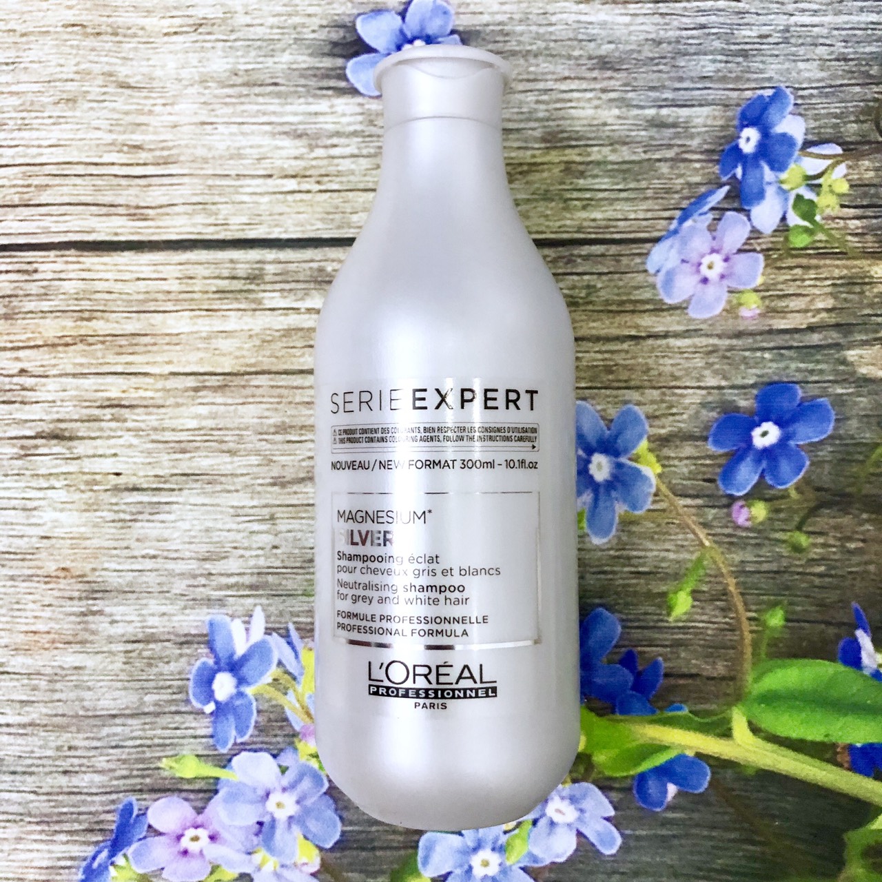 Dầu gội L'oreal Silver Serie Expert Magnesium NeutralisingShampoo for grey and white hair khử ánh vàng cho tóc xám bạch kim 300ml