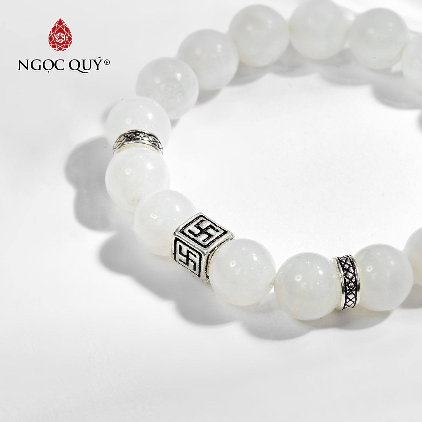 Vòng tay đá xà cừ trắng phối charm chữ vạn bạc Ngọc Quý Gemstones