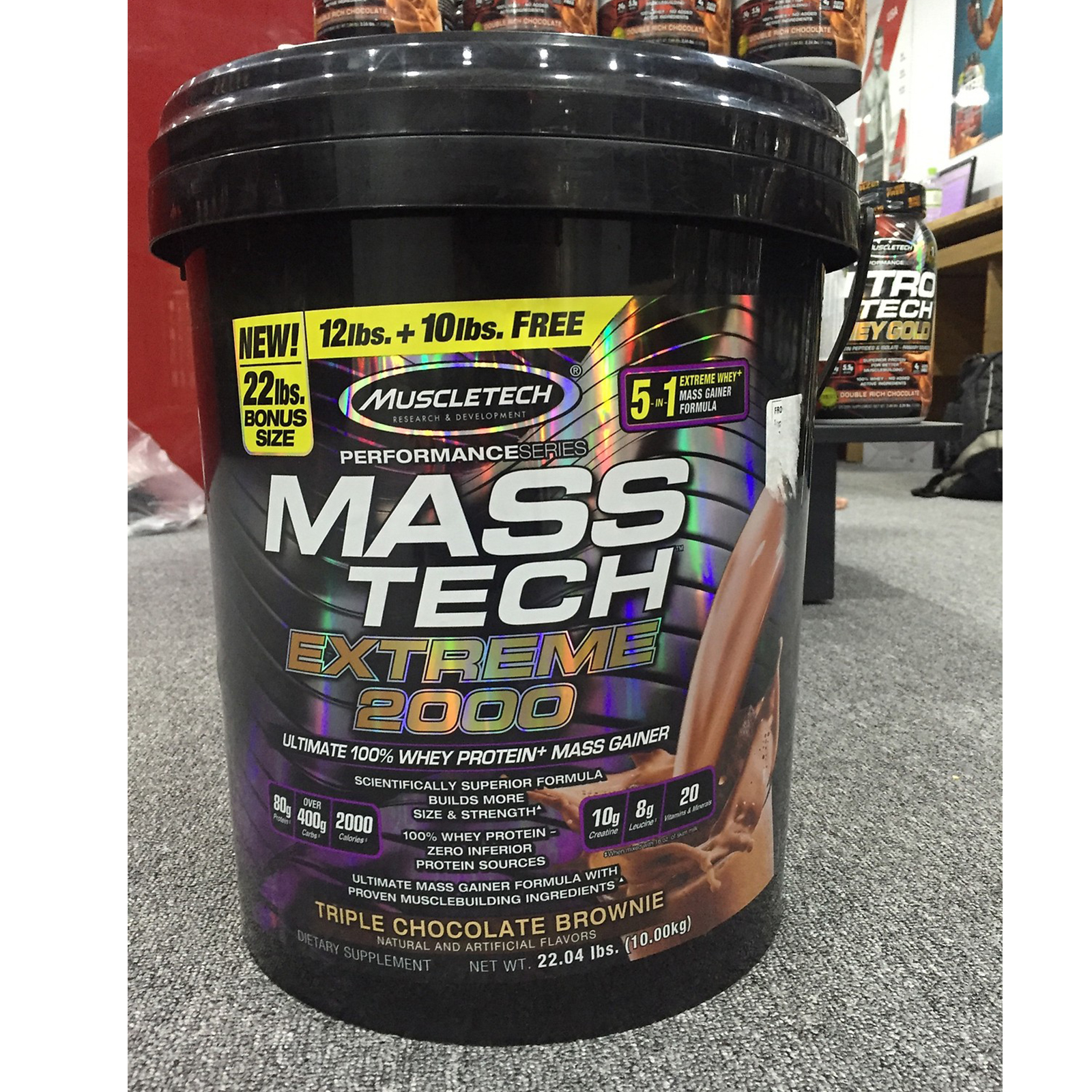 Combo Sữa tăng cân MASS TECH EXTREME 2000 của MuscleTech hương chocolate thùng 10kg hỗ trợ tăng cân tăng cơ nhanh cho người gầy kén ăn, khó hấp thu, khó tăng cân &amp; Bình lắc 600 ml (Màu Ngẫu Nhiên) &amp; Áo Gym size M