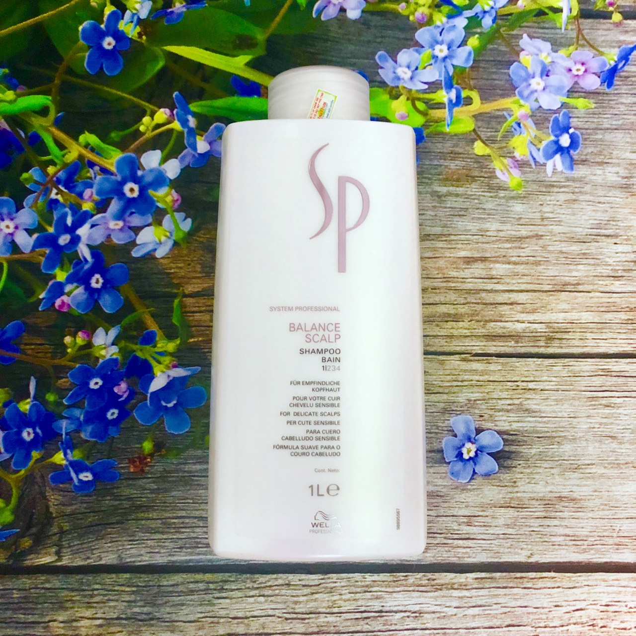 Dầu gội chống rụng và cân bằng độ ẩm da đầu Wella SP System Professional Balance Scalp Shampoo