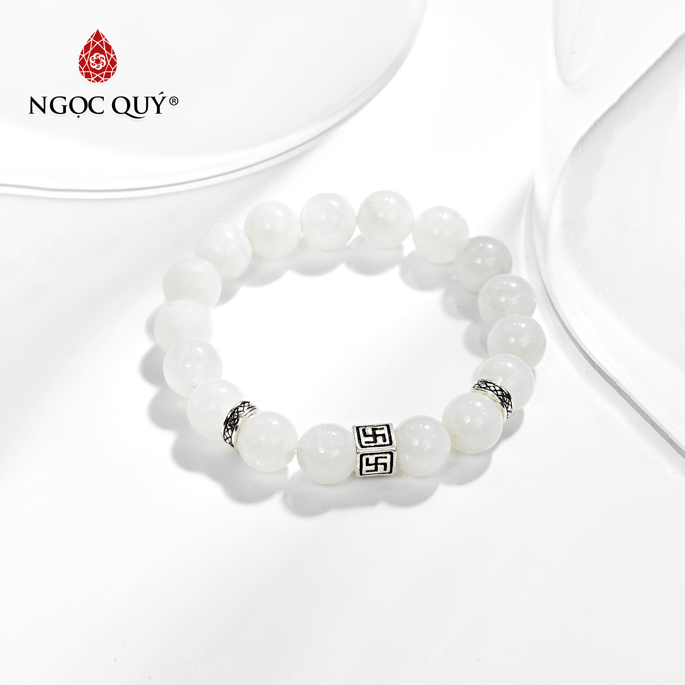 Vòng tay đá xà cừ trắng phối charm chữ vạn bạc Ngọc Quý Gemstones