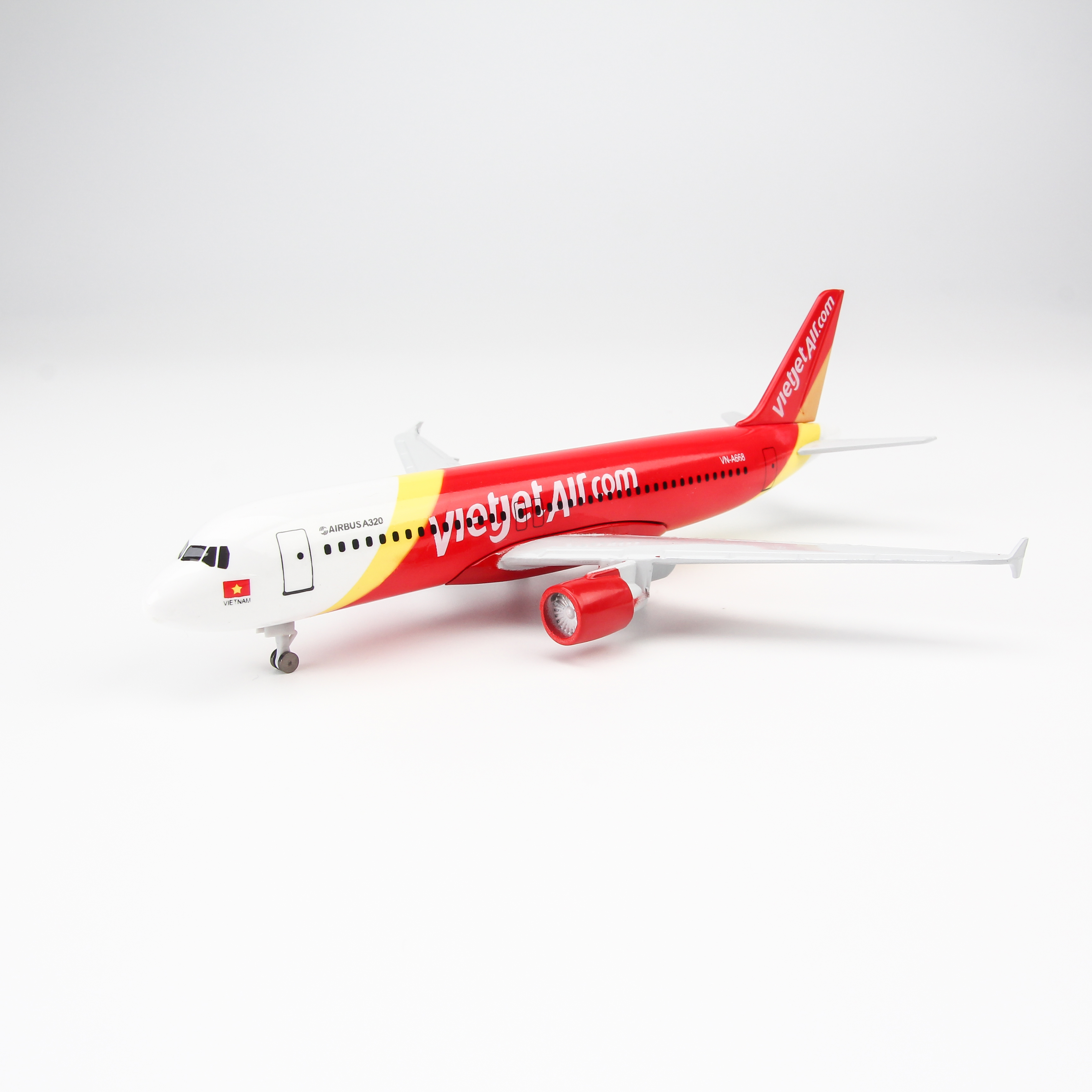 Mô hình máy bay A320 Vietjet Airlines (20cm) (Trắng Đỏ Vàng,có bánh )