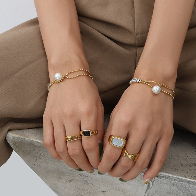 Lắc Tay Ngọc Trai Đá Zircon Titan Ko Han Rỉ TT 3973