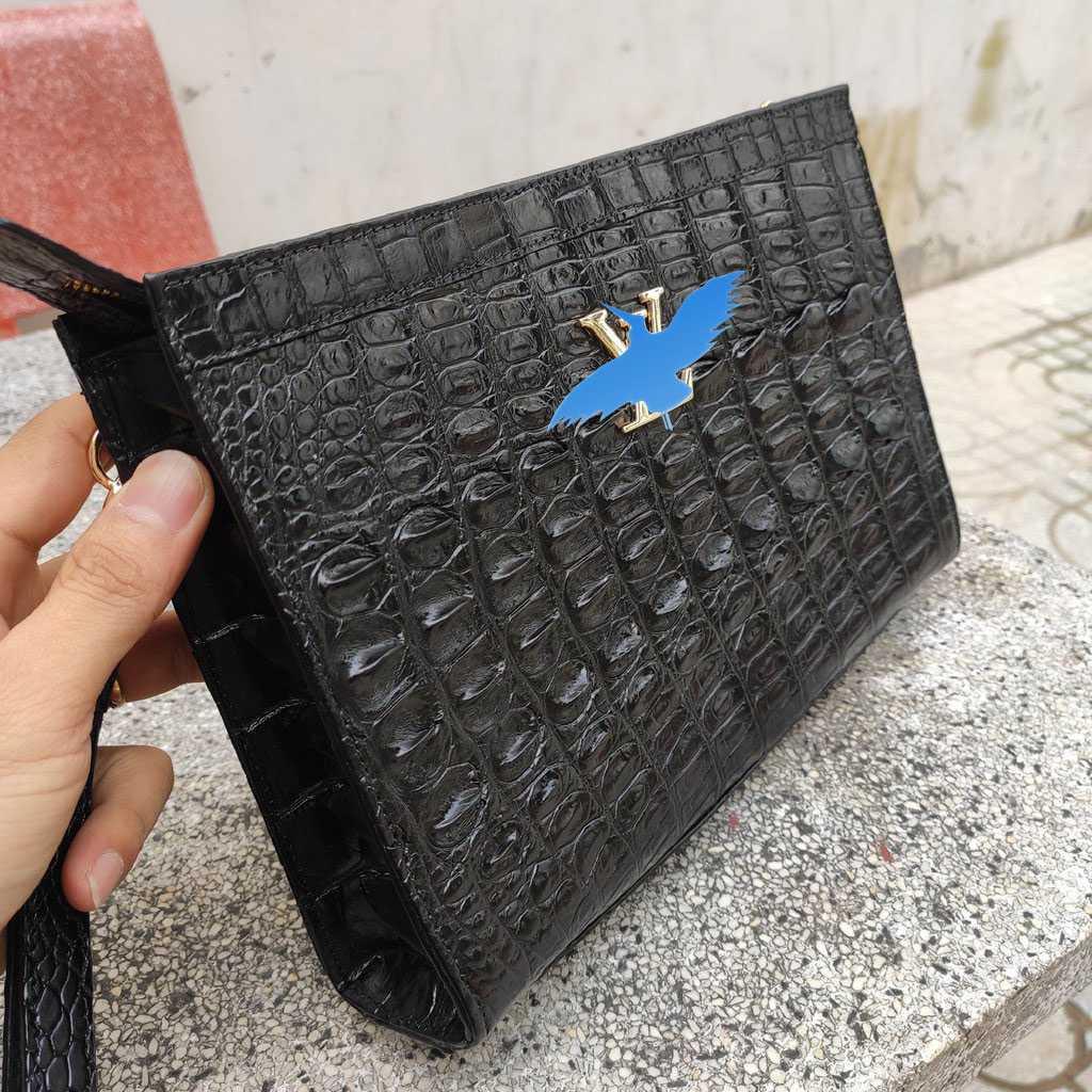 Clutch cầm tay da cá sấu