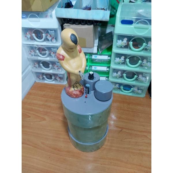 Bình đựng rót rượuu chú tiểu