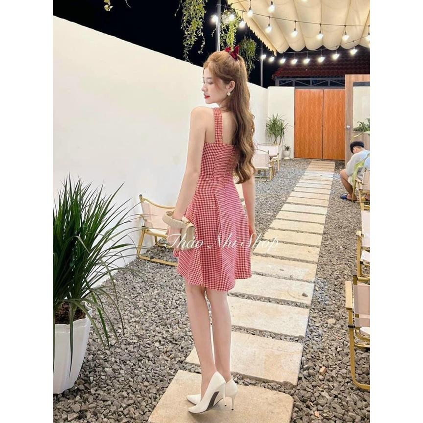 Đầm xoè caro 2 dây cổ xoắn siêu xinh