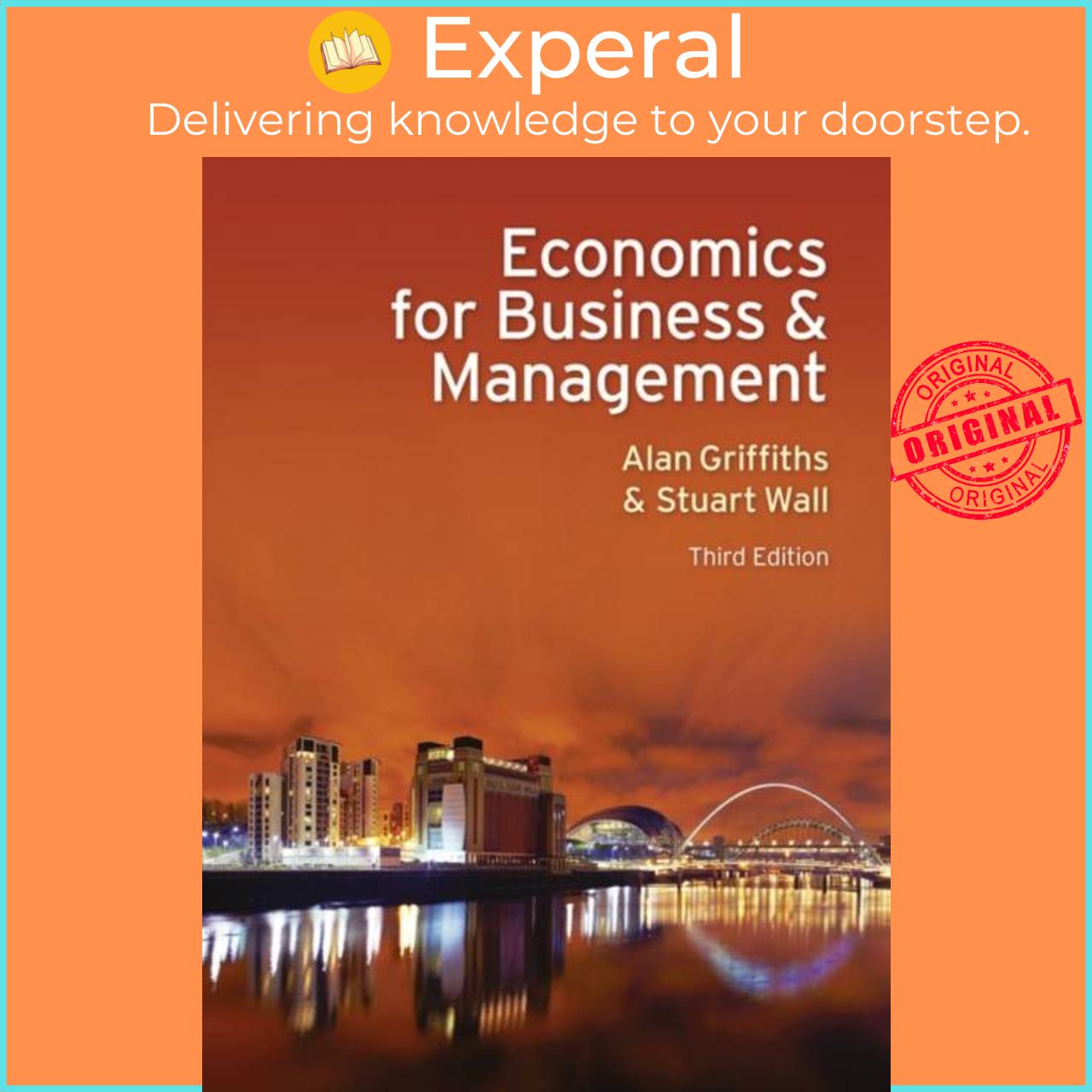 Sách - Economics for Business and Management by Stuart Wall (UK edition, paperback)
