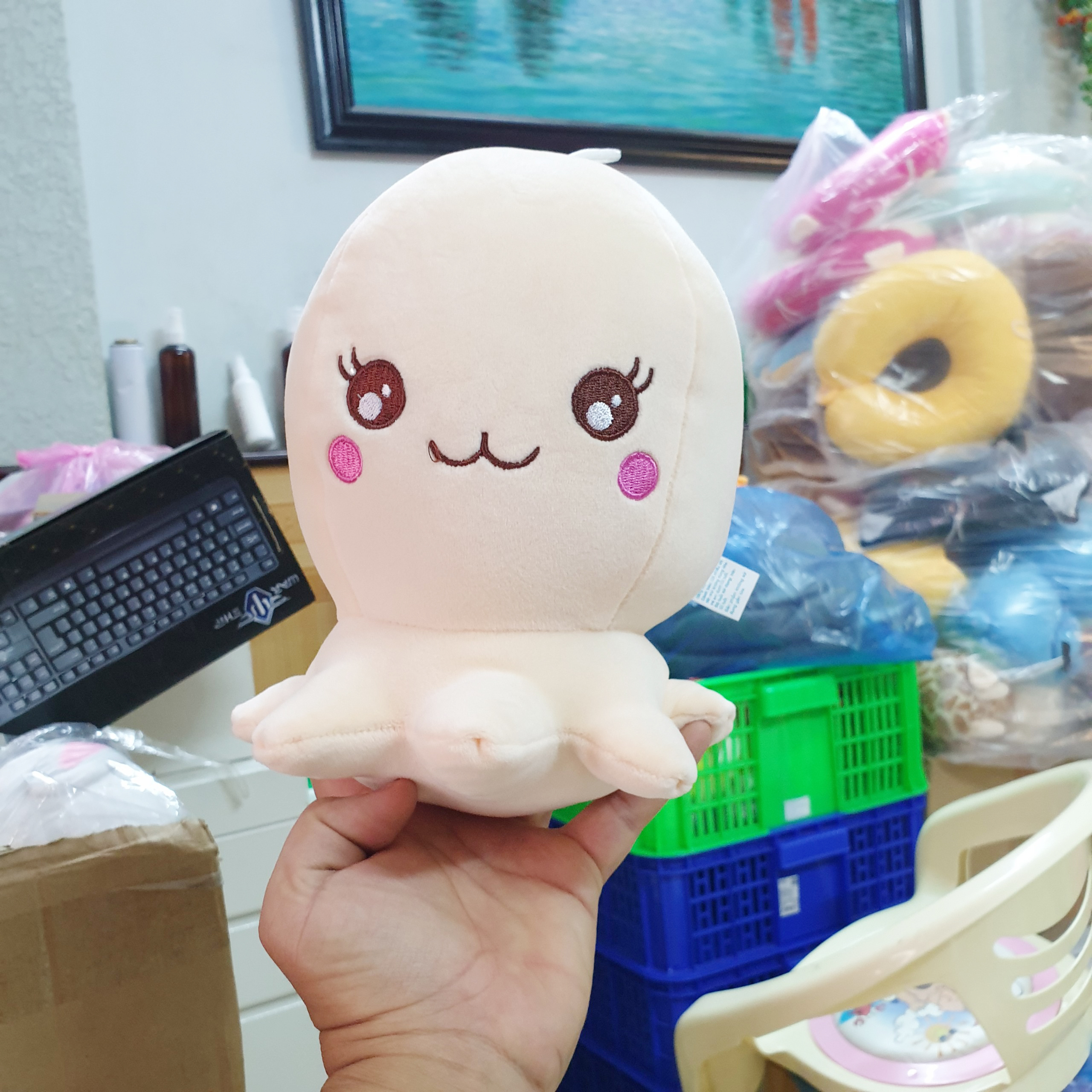 Bạch tuộc nhồi bông size 22cm màu kem