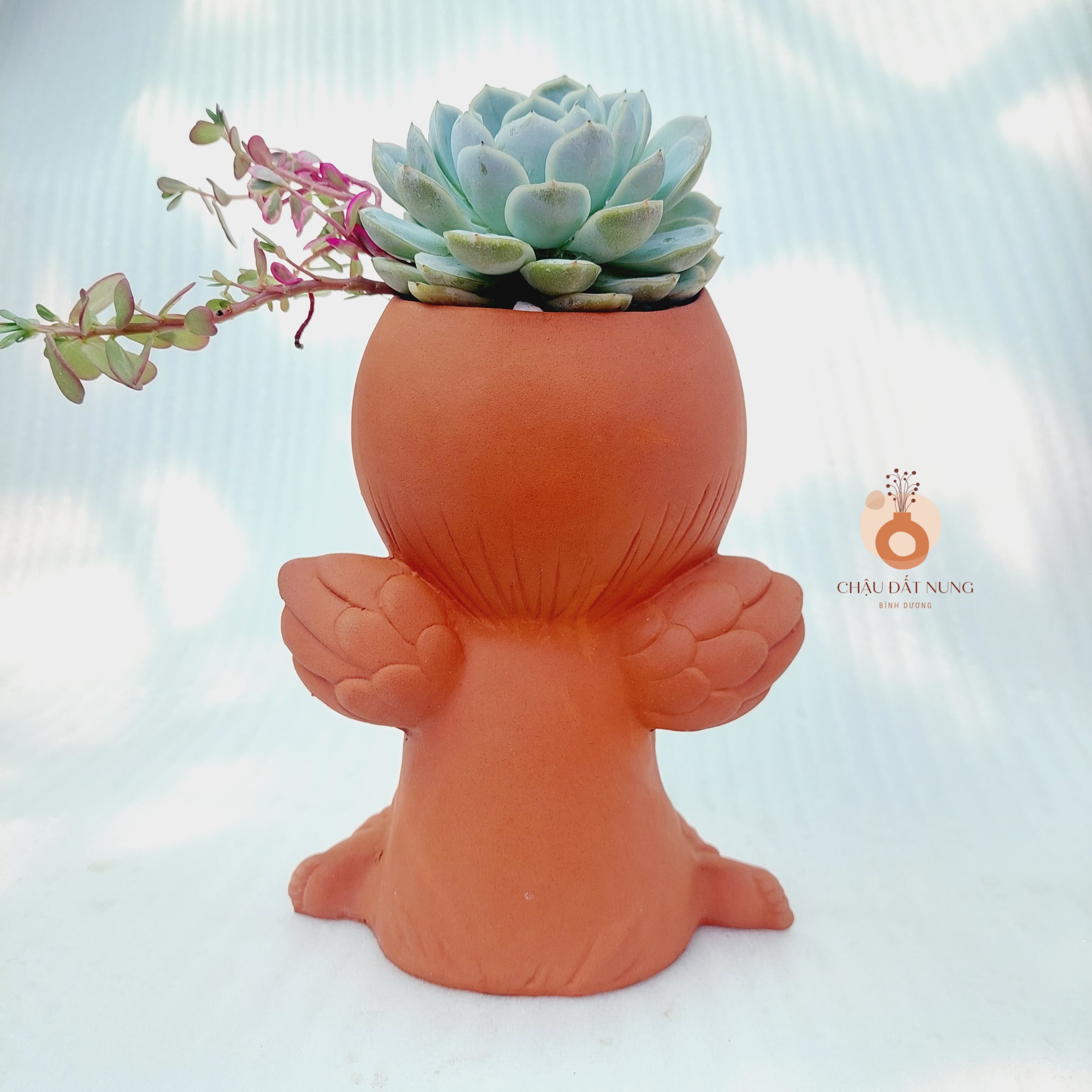 Chậu đất nung Bình Dương - Cô gái Marshal - miệng chậu 8cm, chiều cao 20cm