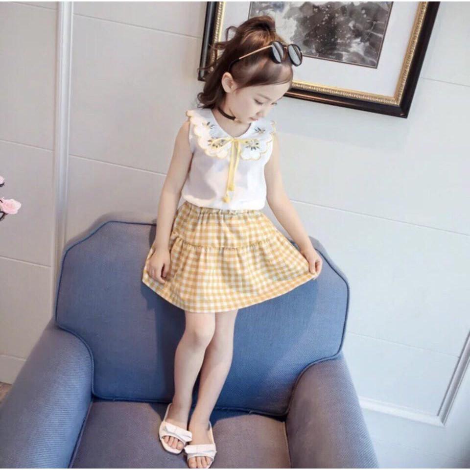 SÉT ÁO CỘT NƠ PHỐI CHÂN VÁY
