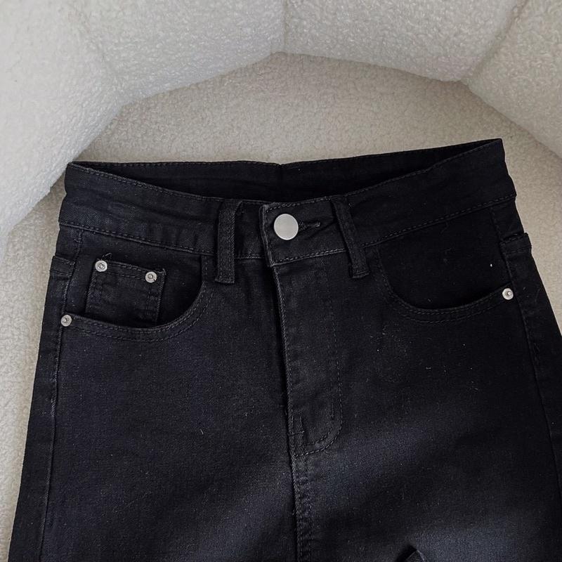 Quần jeans xẻ gấu Bu Jian