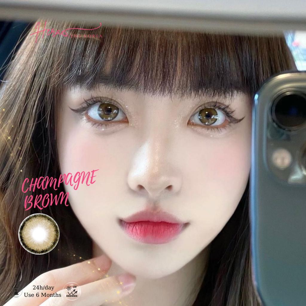 Kính Áp Tròng Hera Nâu Bóng Viền Đen 0 - 6 Độ CHAMPAGNE BROWN Nhập Khẩu Hàn Quốc Lens Cận 6 Tháng