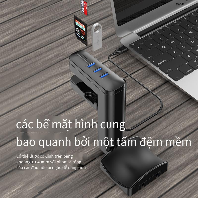 Móc treo tai nghe phong cách mới nhất Chân đế tai nghe miễn phí đấm khung xoay bàn máy tính USB mở rộng móc tai nghe