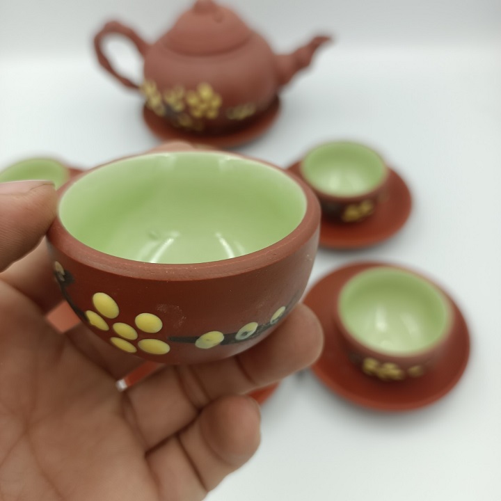 Bộ ấm chén tử sa hoa tiết hoa mai vàng tinh xảo