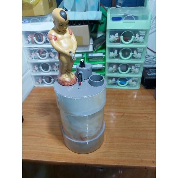 Bình đựng rót rượuu chú tiểu