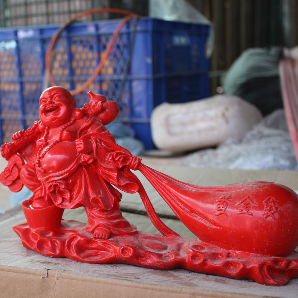 Tượng Phật Di Lặc Kéo Bao Tiền Bằng Đá Cao 50cm - Điêu Khắc Tượng Đá Từ Đá Tự Nhiên Nguyên Khối Cao Cấp