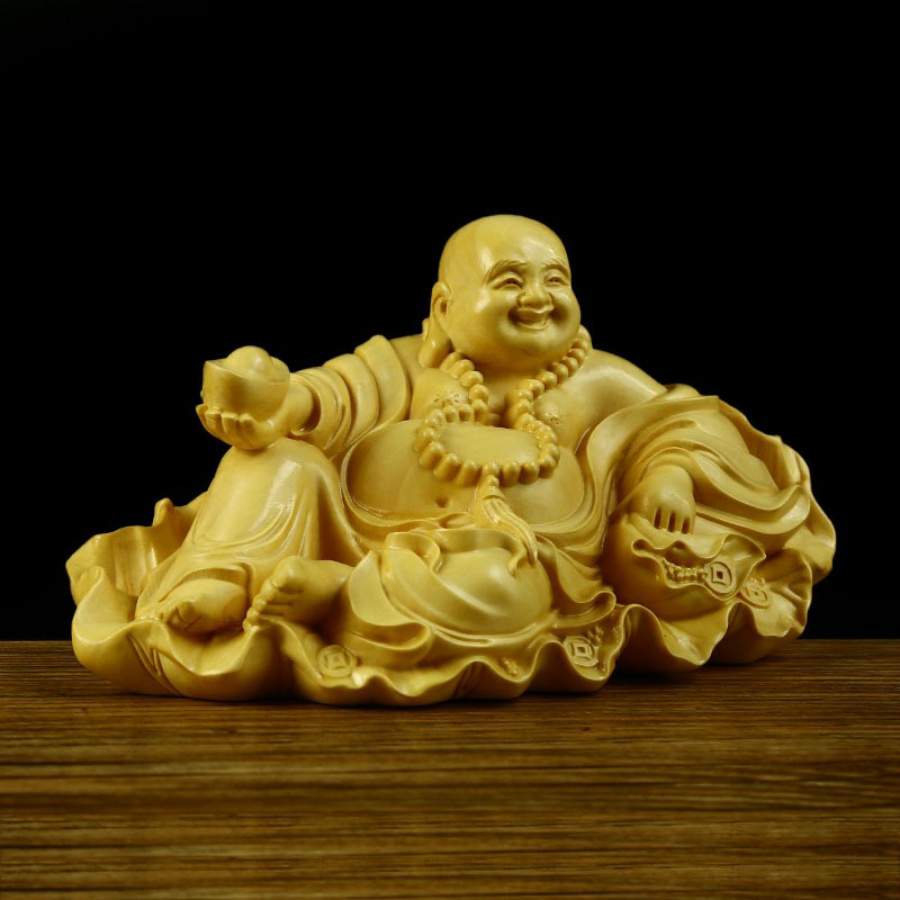 TƯỢNG PHẬT DI LẶC NGỒI LÁ SEN CẦM THỎI VÀNG GỖ HOÀNG DƯƠNG CAO 7 cm