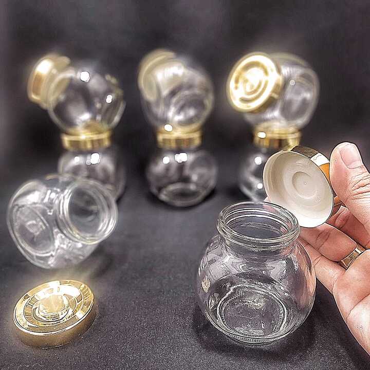 Hũ thủy tinh đựng gia vị 180ml mẫu Tròn Dẹt kiểu nghiêng 2 đáy - nắp nhựa vàng - hũ chưng yến thuỷ tinh, lọ đựng bánh kẹo, hạt dưa, tổ yến, mật ong, sữa ong chúa, thực phẩm, mỹ phẩm