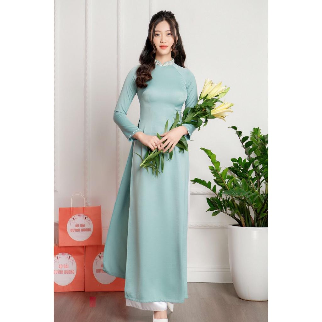 Áo dài lụa tây thi màu xanh đính hạt trai by Quỳnh Hương